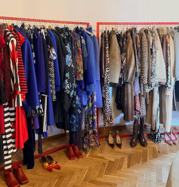 Colourful vintage clothing and shoes in the shop